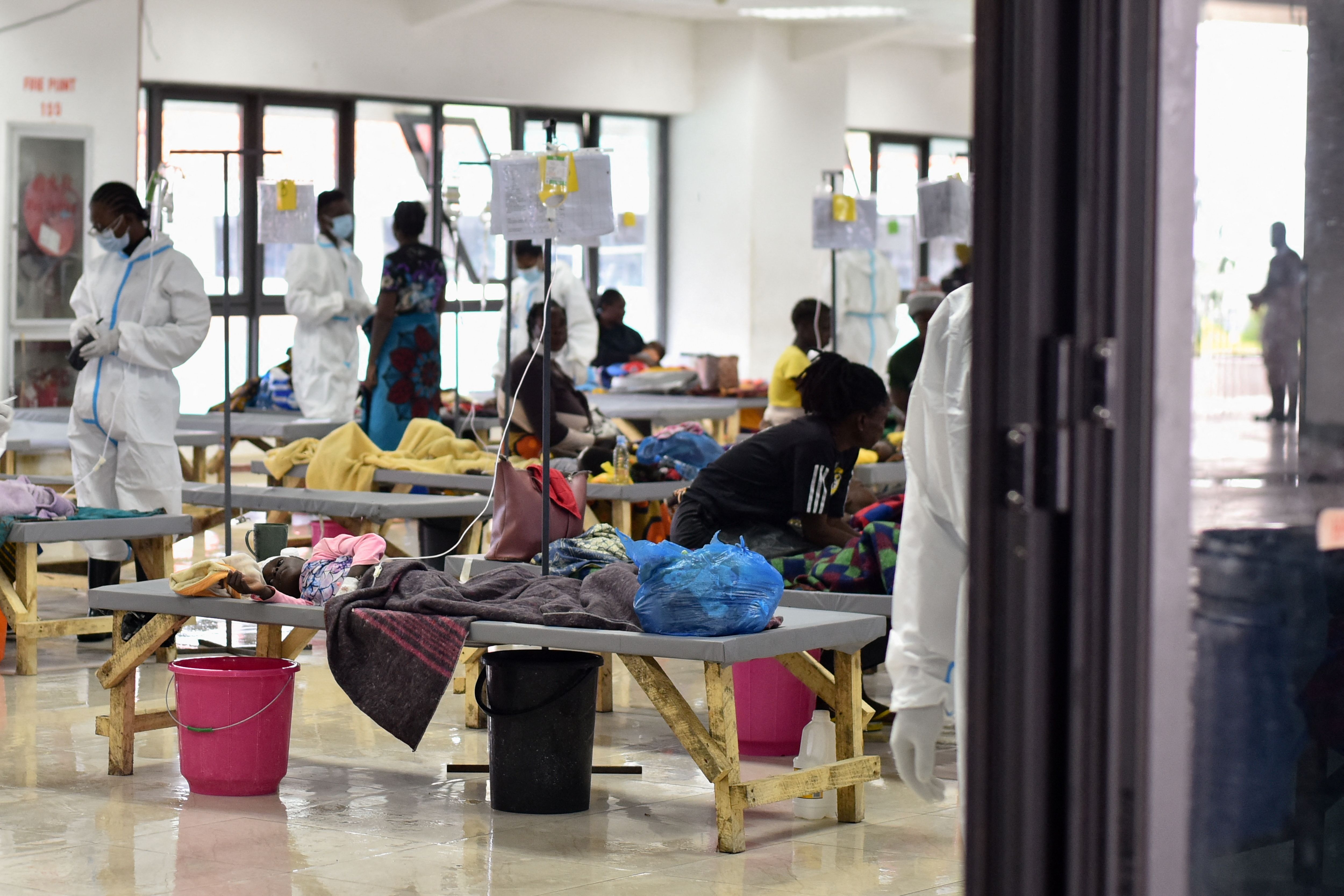 People receive treatment at an emergency cholera facility in Zambia.