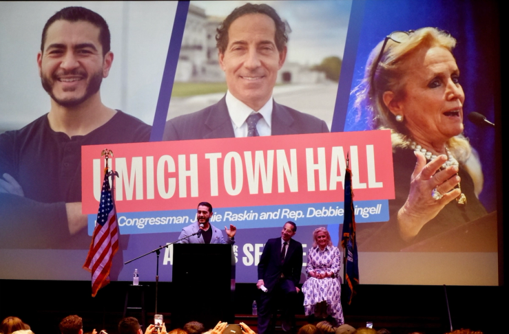 Abdul El-Sayed, at podium, with Reps. Jamie Raskin, D-Md., and Debbie Dingell, D-Mich.