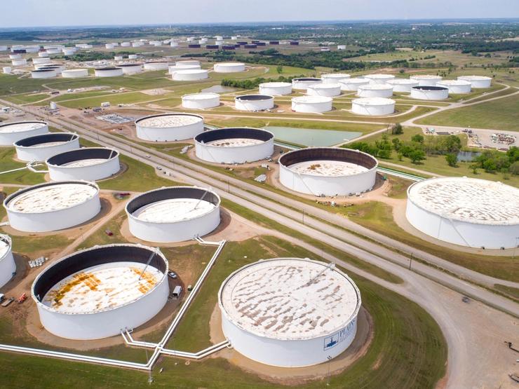 Crude oil storage tanks are seen in an aerial photograph at the Cushing oil hub.