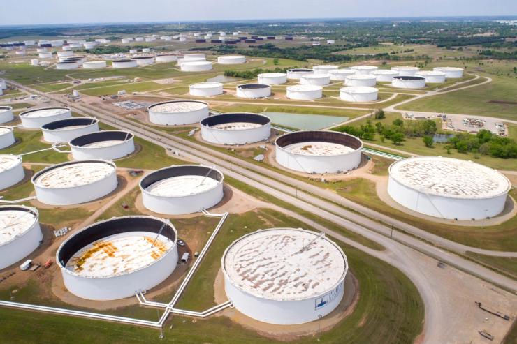Crude oil storage tanks are seen in an aerial photograph at the Cushing oil hub.