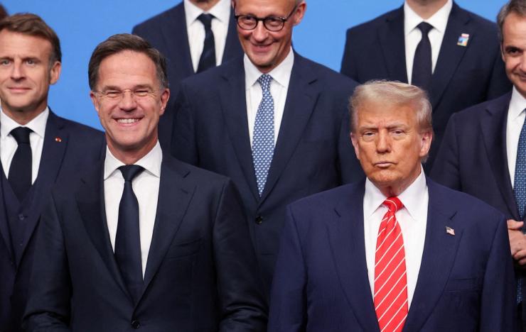 NATO leaders pose for a group photo at a summit in 2025