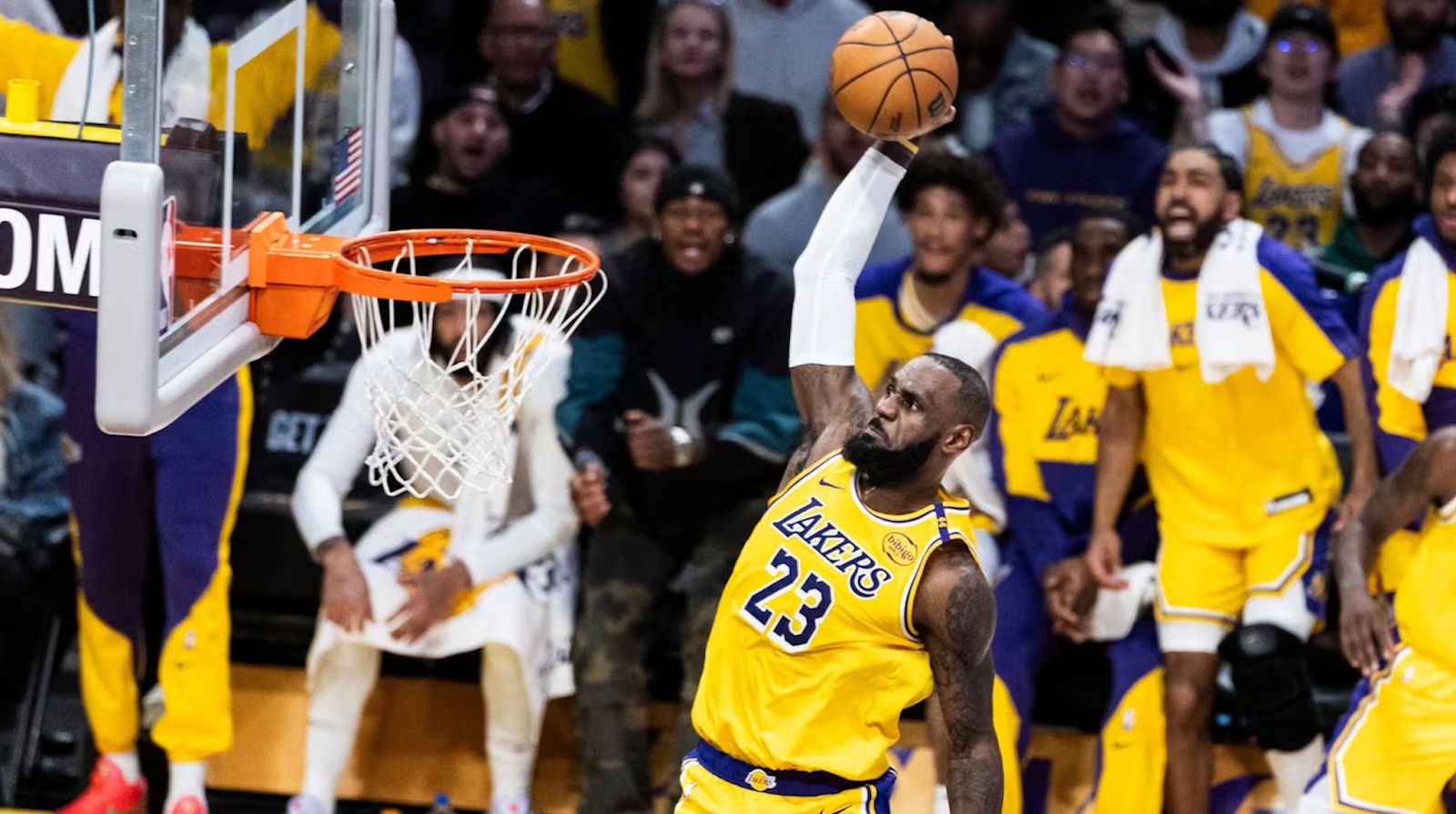 LeBron James dunking. 