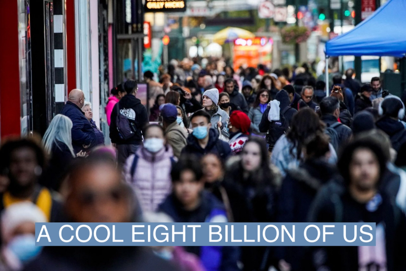 People walk on the New York City street of 34 in Manhattan as according to a United Nations report, the world’s population is estimated to reach 8 billion by November 15 of this year, in New York, U.S., November 14, 2022.