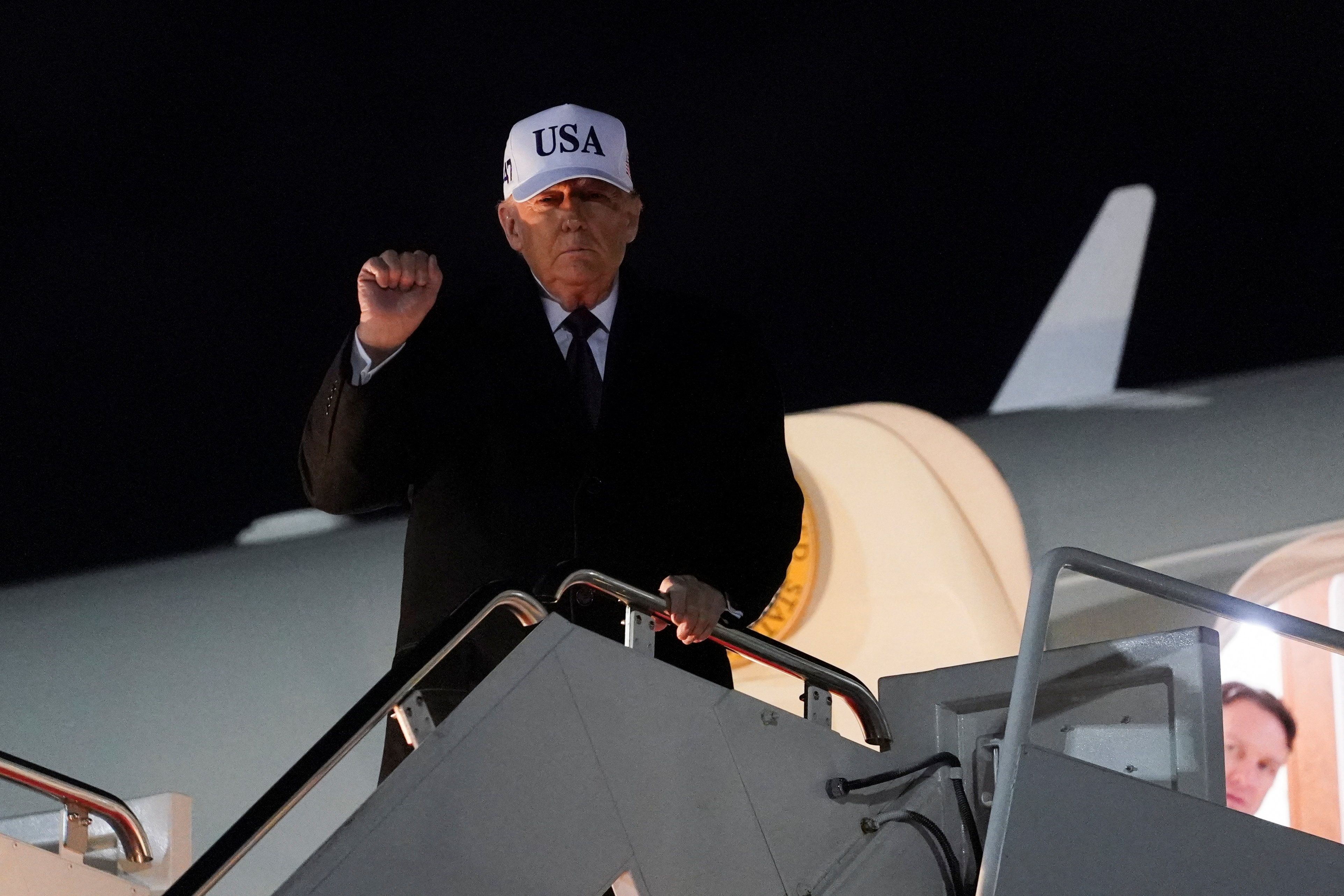 US President Donald Trump with a USA hat.