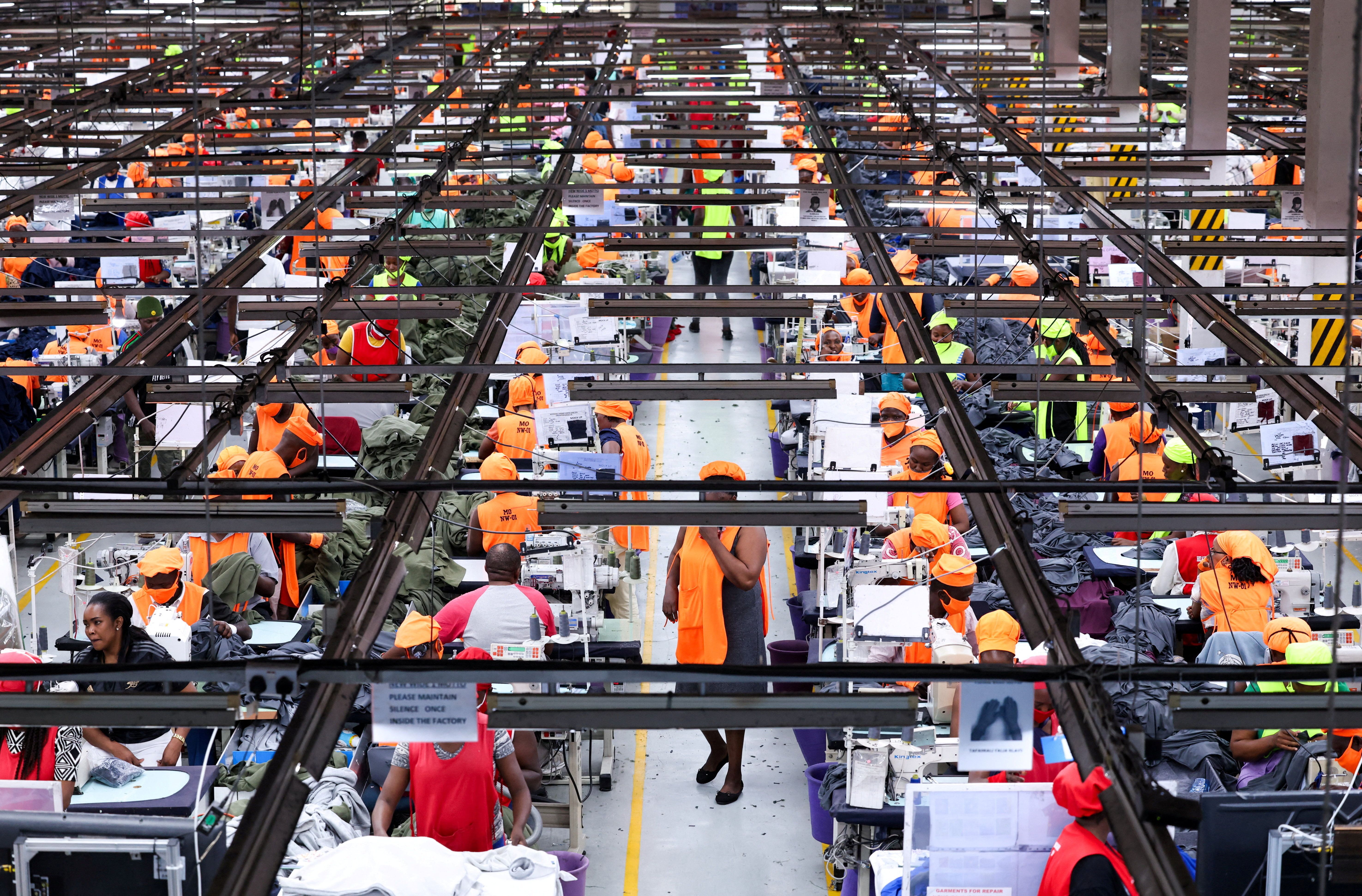 Kenyan workers prepare clothes for export at a factory operating under the US African Growth and Opportunity Act, in Kitengela on Sept. 19, 2025.