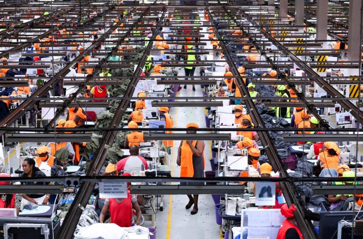 Kenyan workers prepare clothes for export at a factory operating under the US African Growth and Opportunity Act, in Kitengela on Sept. 19, 2025.