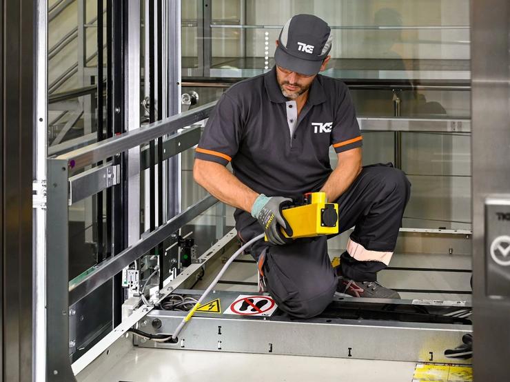 Technician cabin roof inspection, courtesy of TK Elevator.