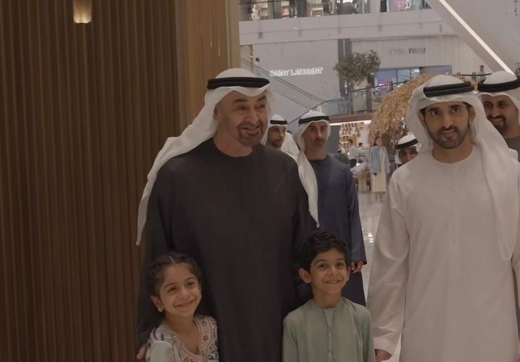 UAE President Mohamed bin Zayed posing with childen at the Dubai Mall.