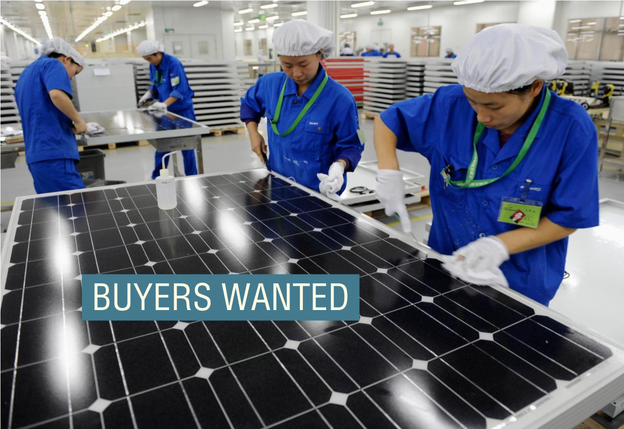 Employees inspect solar panels at a workshop in Chint Solar Co. Ltd. factory in Hangzhou, Zhejiang province December 8, 2009.