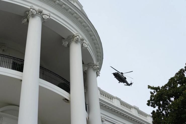 Marine One flies over the White House