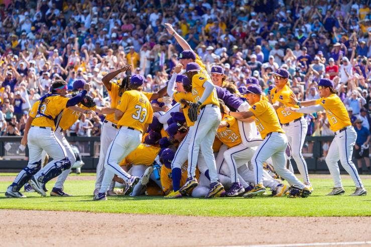 The LSU Tigers celebrate after defeating the Coastal Carolina Chanticleers.