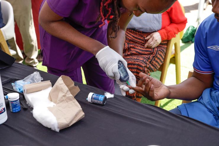 A man receives a free diabetes blood test in Nairobi.