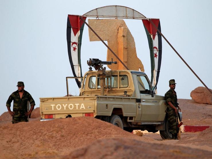 Polisario Front soldiers stand at an entrance of the fifth sector base in Bir Lahlou, Western Sahara