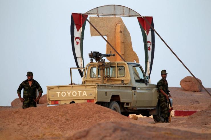 Polisario Front soldiers stand at an entrance of the fifth sector base in Bir Lahlou, Western Sahara