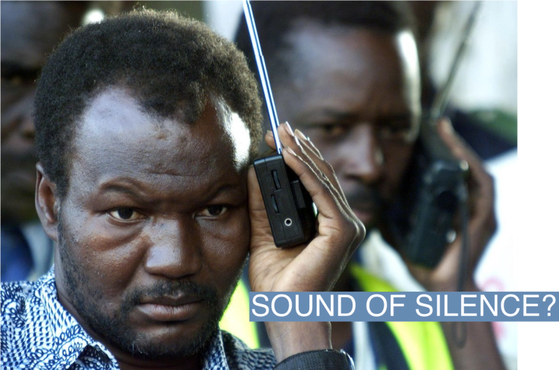 Malian soccer fans listen to radio commentary as they watch televison coverage of hosts Mali beating South Africa in the quarter final of the African Nations Cup in Bamako January 3, 2002. Mali won 2-0, sending World Cup finalists South Africa home and moving the hosts onto the semifinals