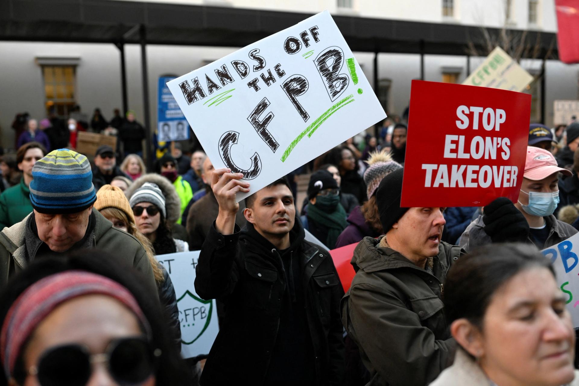 Supporters of the Consumer Financial Protection Bureau (CFPB) rally after the agency’s shutdown.