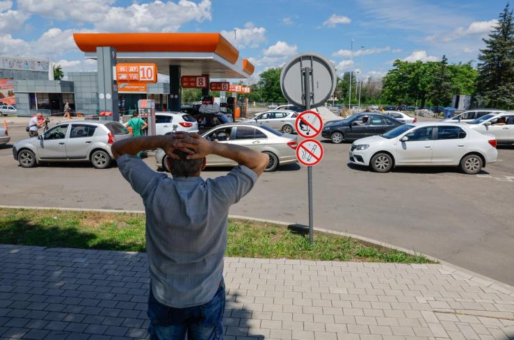 Cars queue at a gas station in Donetsk