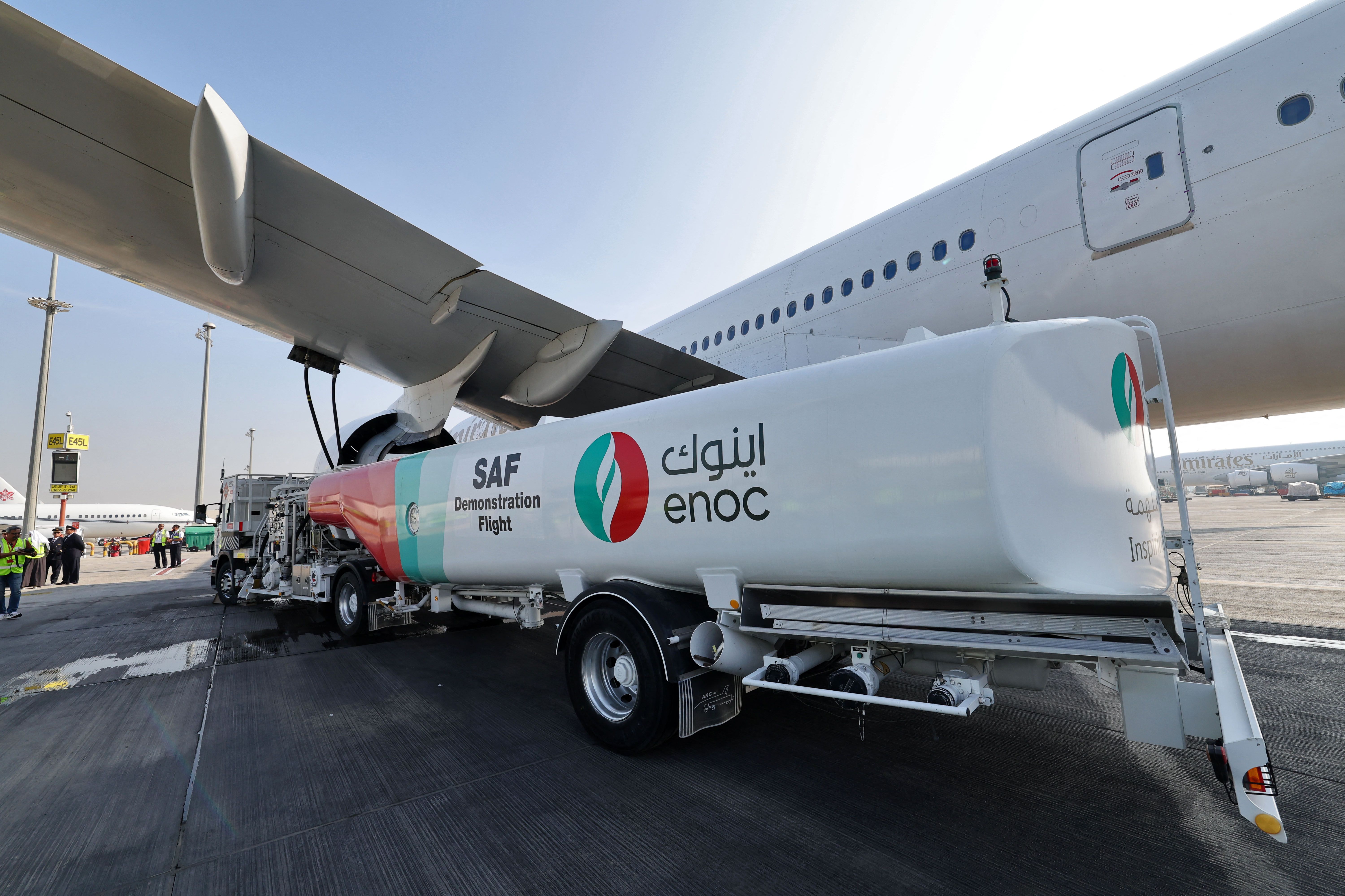 A plane being filled with sustainable jet fuel.