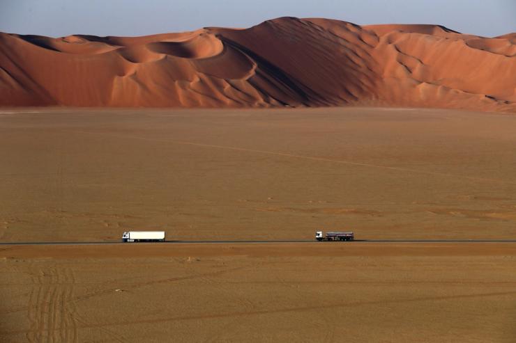 Cargo trucks drive through the Empty Quarter, in Shubaytah, Saudi Arabia, Jan. 11, 2024.