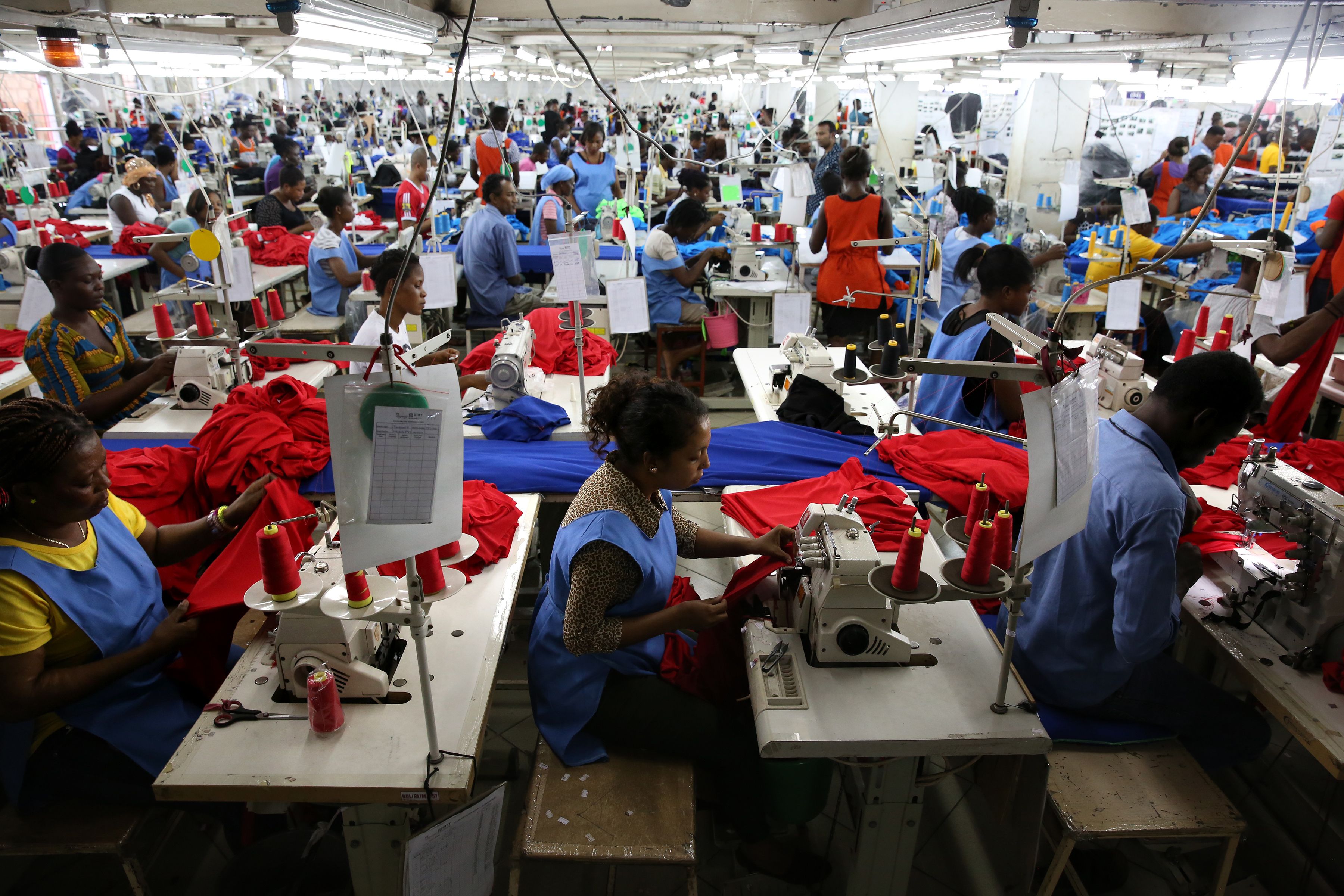 Factory workers producing shirts for overseas clients, in Accra, Ghana
