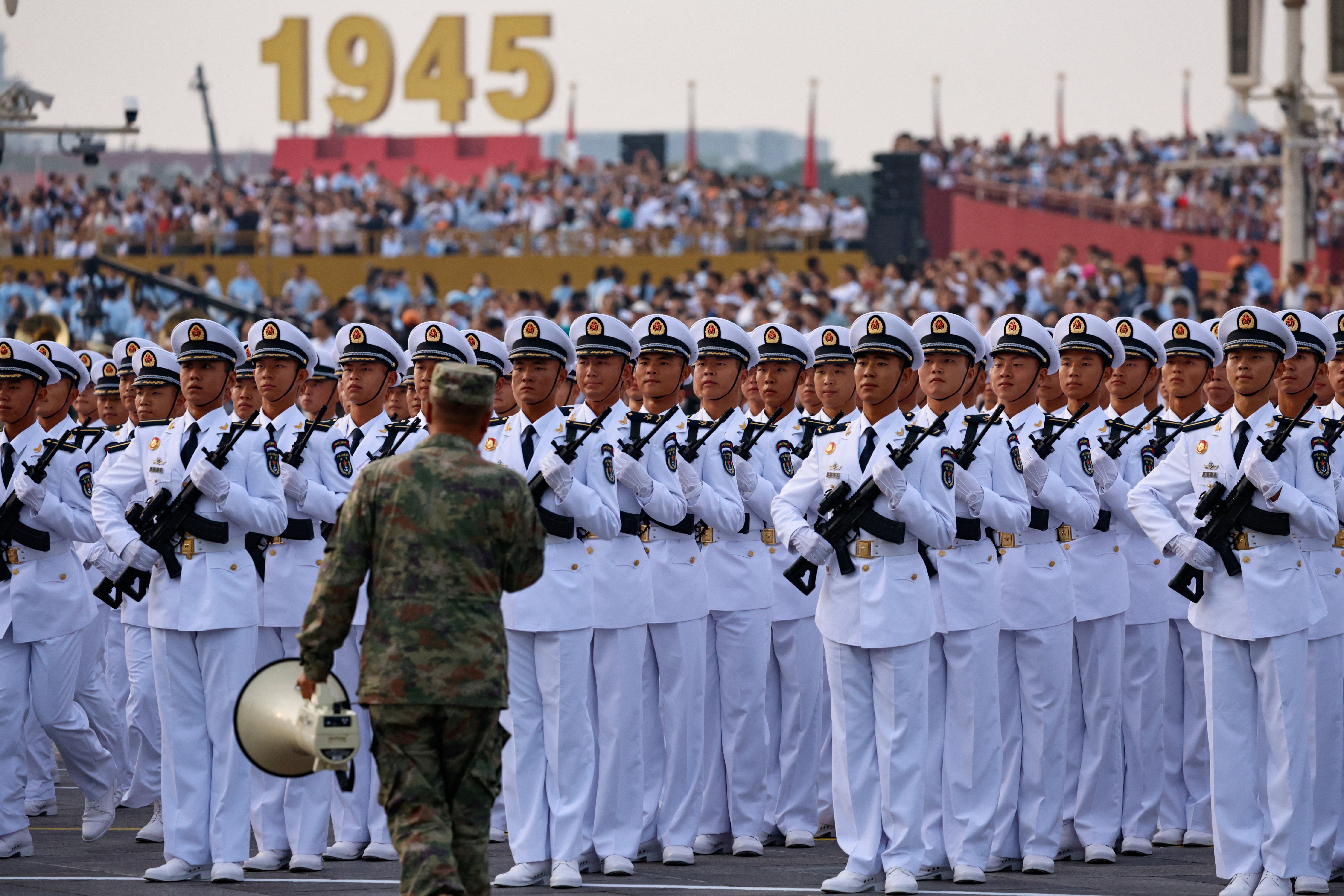 Members of Chinese People’s Liberation Army (PLA) Navy march.