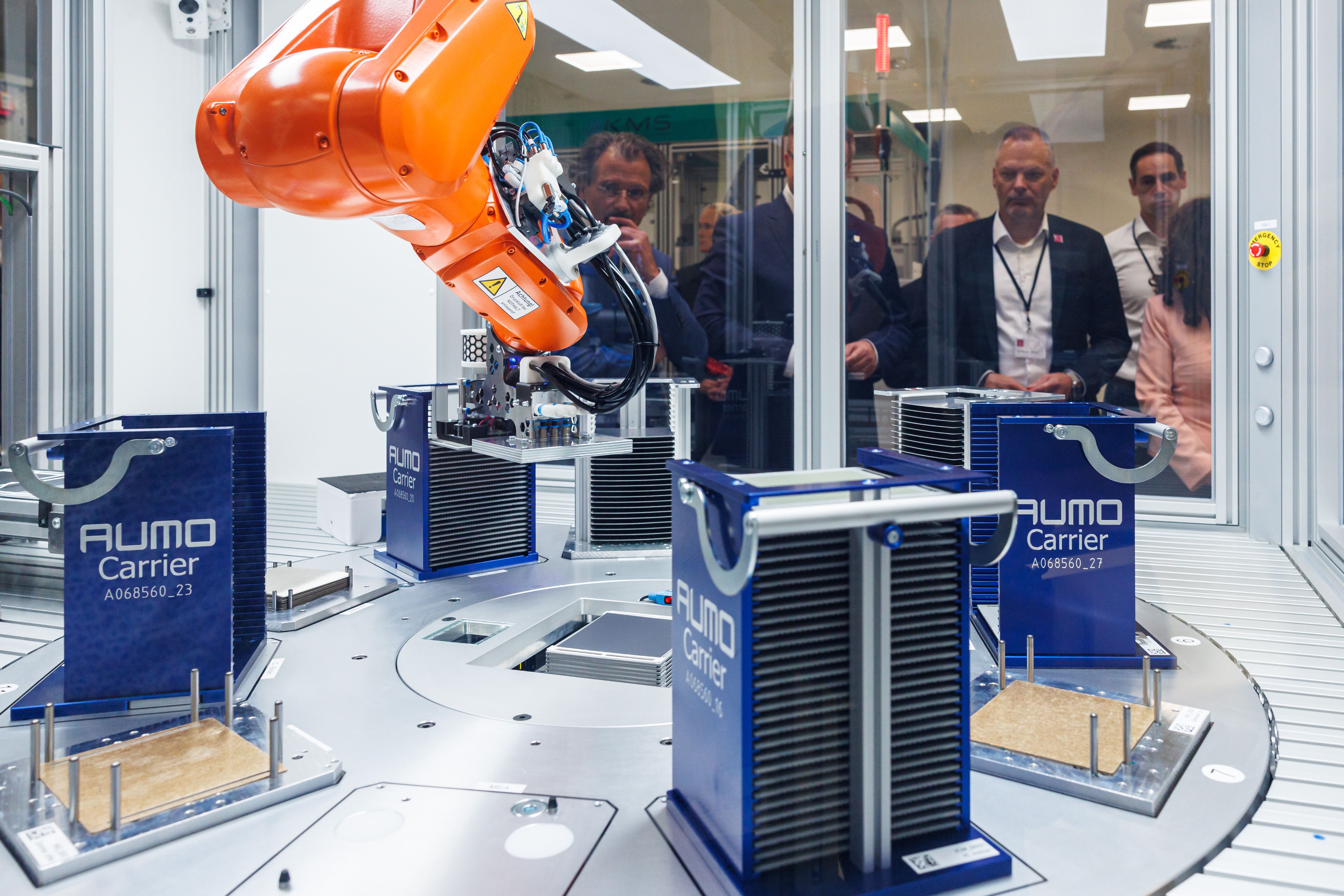 Visitors attend the inaugural opening of the new ThyssenKrupp Nucera SOEC green hydrogen components pilot plant.