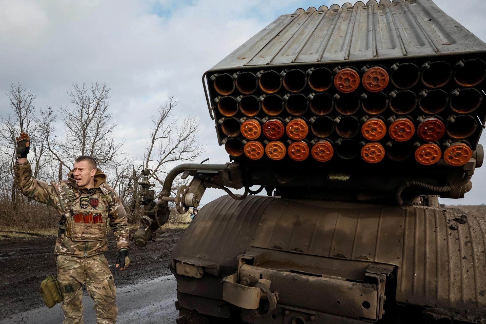 A Ukrainian soldier prepares to fire a BM-21 Grad multiple launch rocket system towards Russian troops near a frontline, amid Russia's attack on Ukraine in the Donetsk region on Feb. 4..