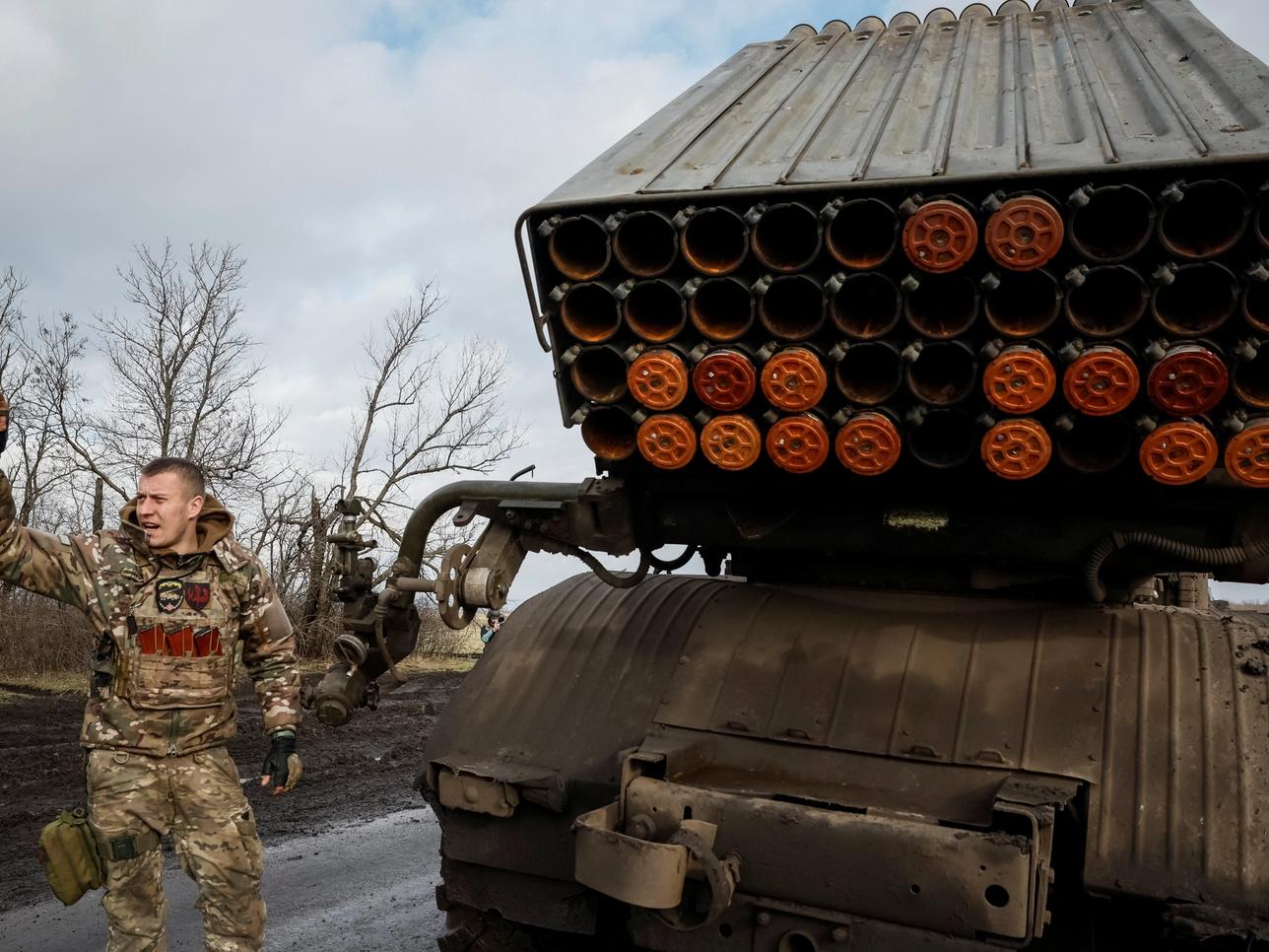 A Ukrainian soldier prepares to fire a BM-21 Grad multiple launch rocket system towards Russian troops near a frontline, amid Russia's attack on Ukraine in the Donetsk region on Feb. 4..
