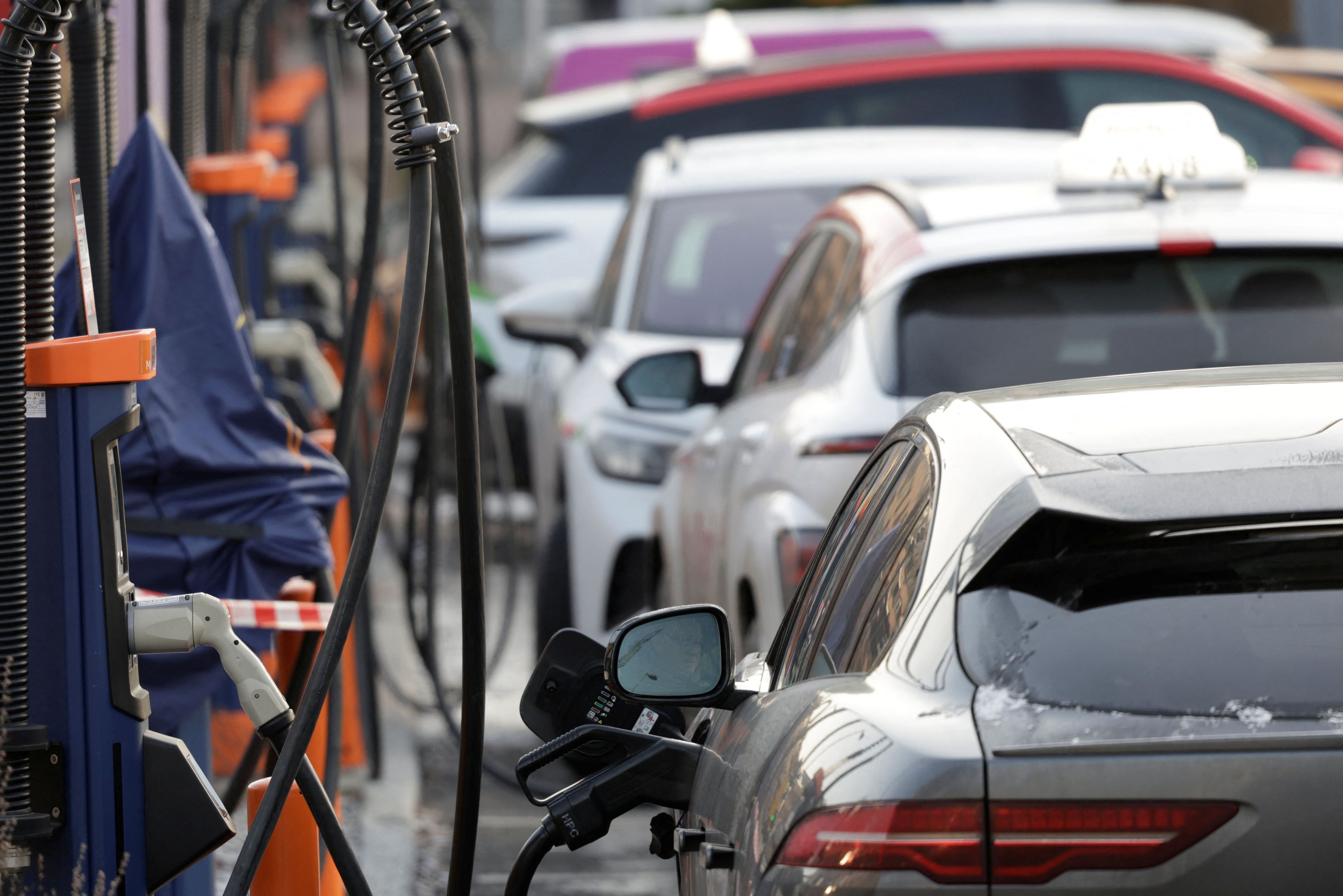 Cars get charged at a charging point in Oslo, Norway.
