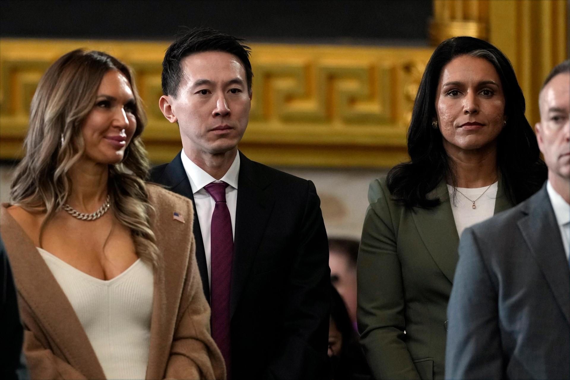 TikTok CEO Shou Chew, center, stands with Tulsi Gabbard, right, the nominee to be the next director of national intelligence, during the 60th Presidential Inauguration