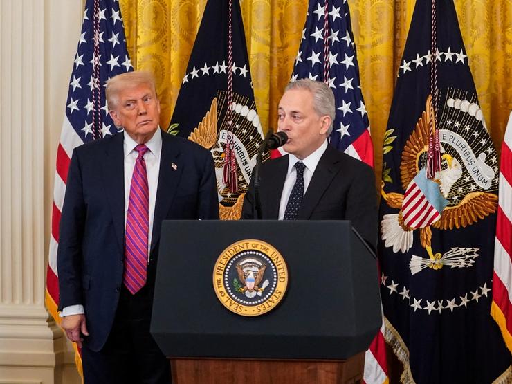 David Sacks speaks next to US President Donald Trump