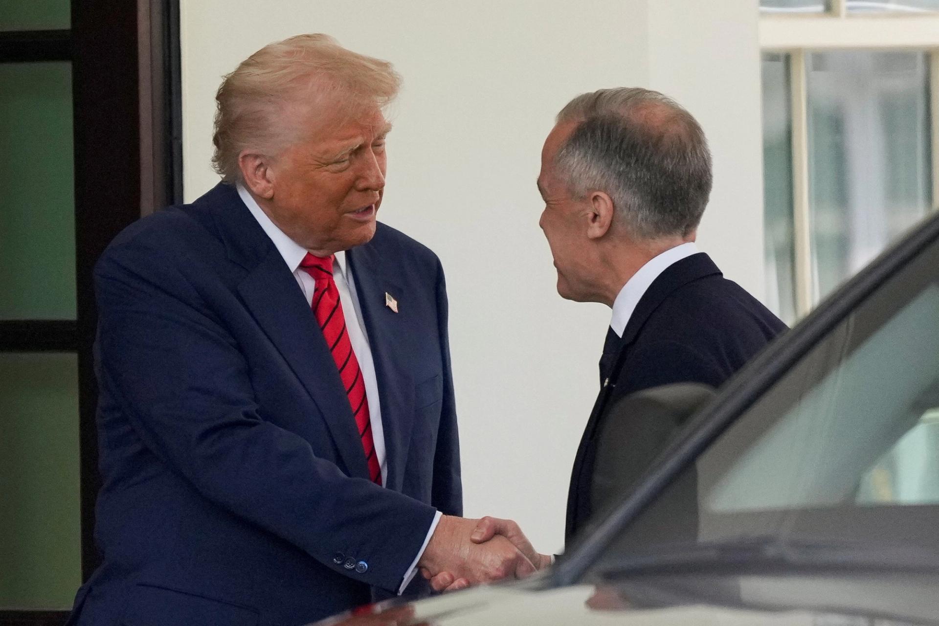 U.S. President Donald Trump greets Canadian Prime Minister Mark Carney at the White House in Washington, D.C., U.S., May 6, 2025. 
