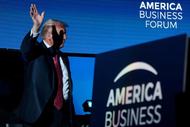 US President Donald Trump attends the American Business Forum.