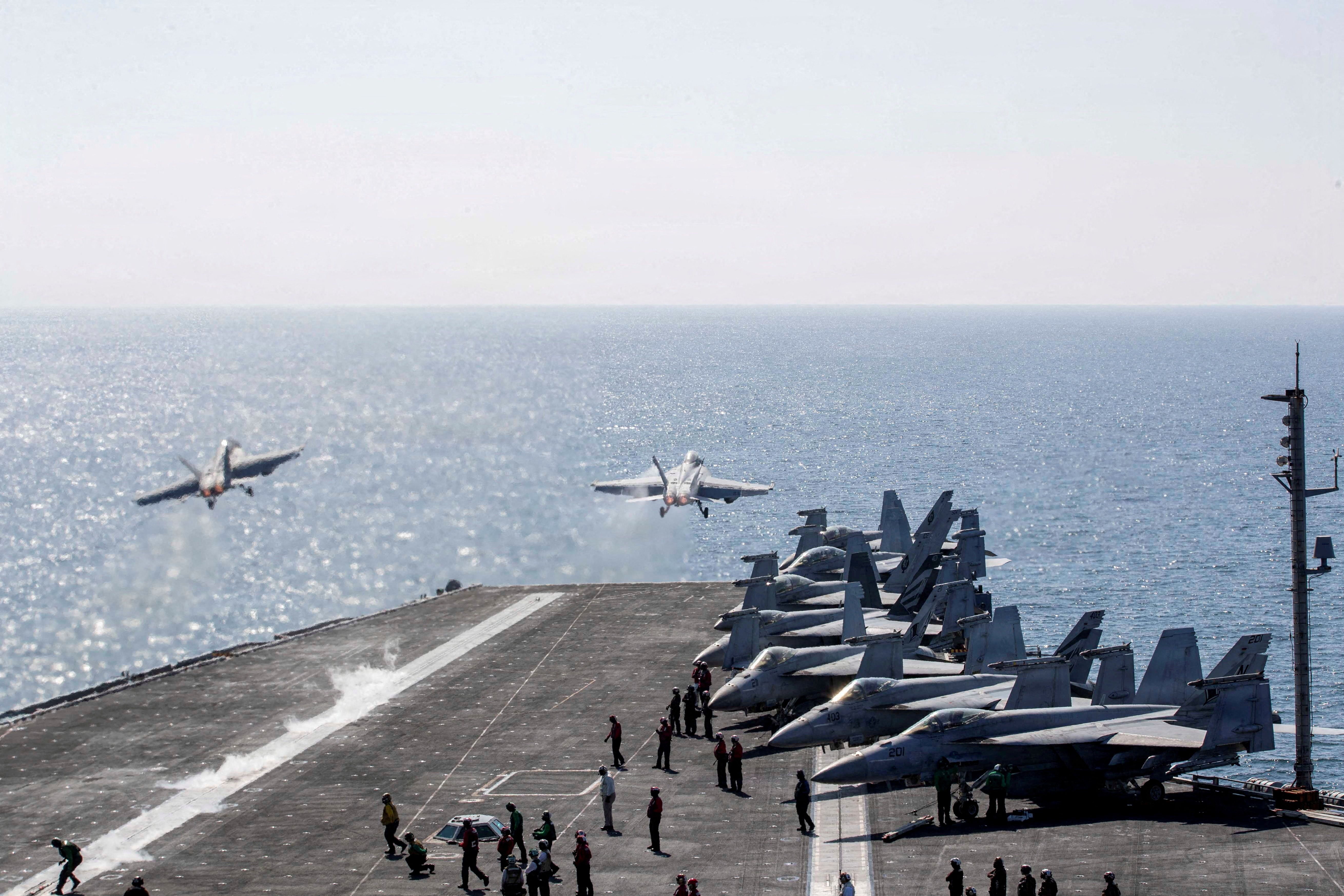 US fighter jets take off from the USS Nimitz aircraft carrier