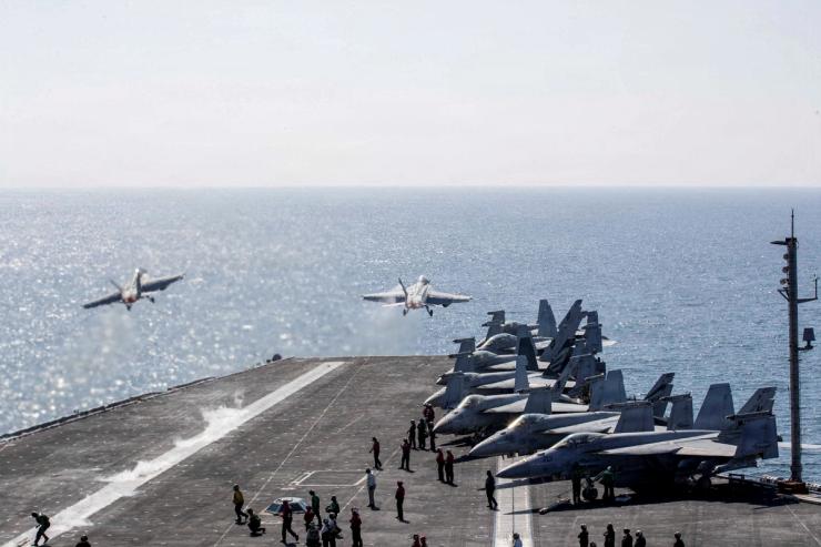 US fighter jets take off from the USS Nimitz aircraft carrier