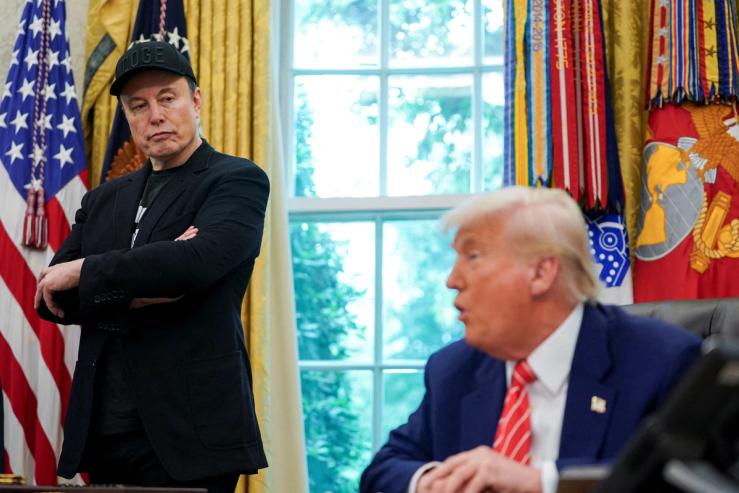 US President Donald Trump and Elon Musk attend a press conference in the Oval Office.