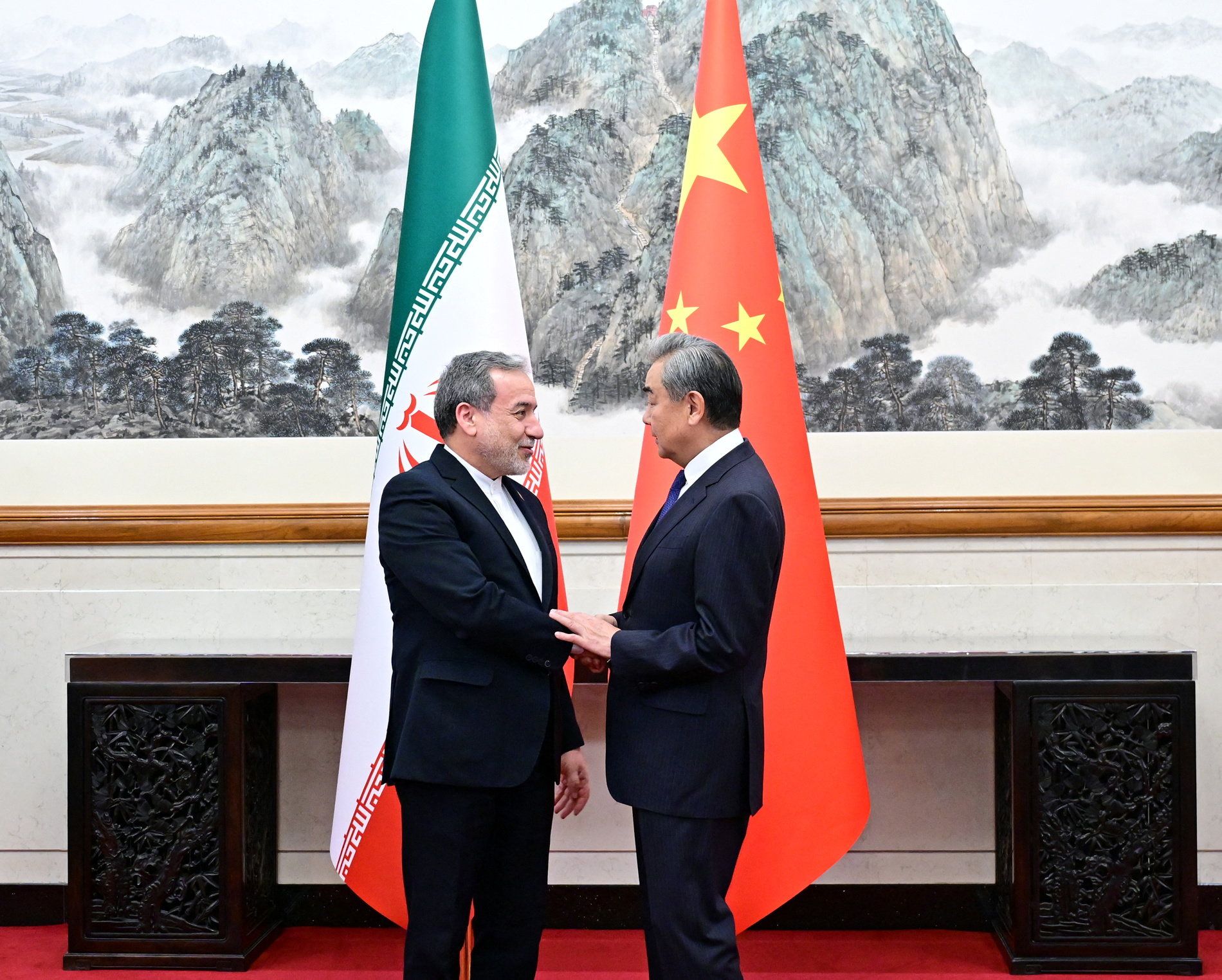 Chinese Foreign Minister Wang Yi and Iranian Foreign Minister Abbas Araqchi