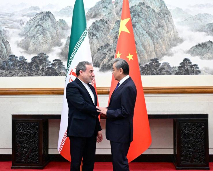 Chinese Foreign Minister Wang Yi and Iranian Foreign Minister Abbas Araqchi