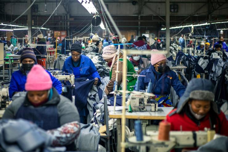Garment factory workers operate sewing machines in Lesotho.