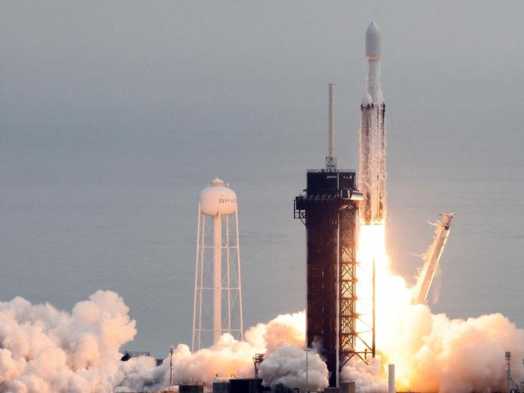 A SpaceX Falcon Heavy rocket lifts off carrying a NASA spacecraft to investigate the Psyche asteroid from the Kennedy Space Center in Cape Canaveral, Florida,