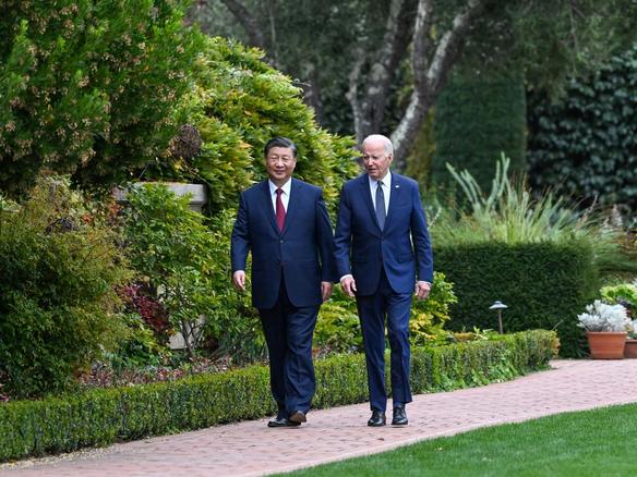 Chinese President Xi Jinping and U.S. President Joe Biden take a walk after their talks in the Filoli Estate in California on Nov. 15, 2023. 