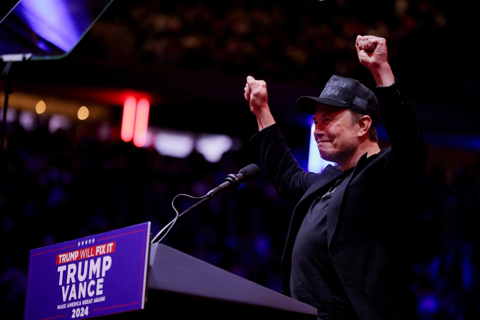 Elon Musk gestures on stage during a rally for Republican presidential nominee and former U.S. President Donald Trump at Madison Square Garden.