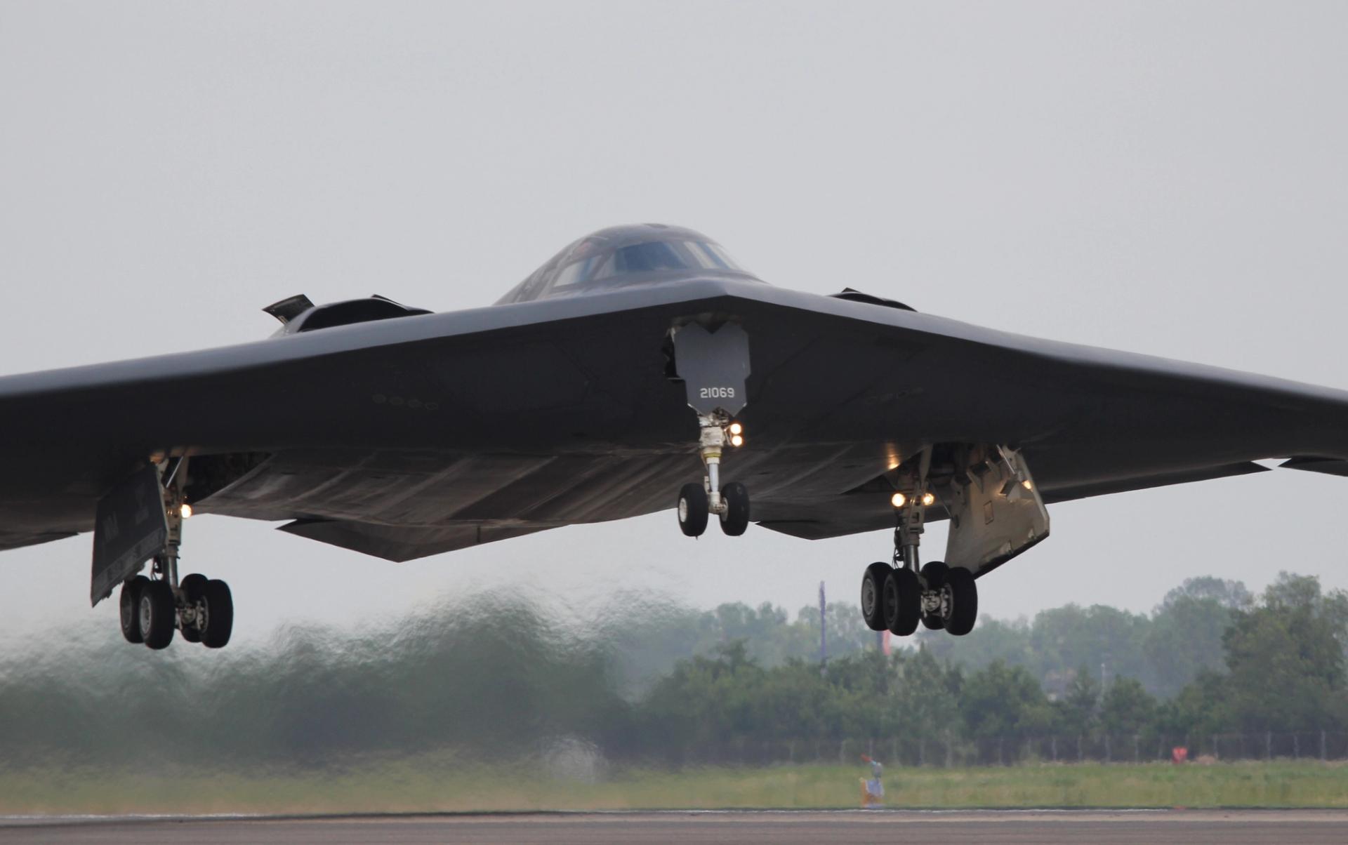 A grey B-2 Spirit Stealth Bomber takes flight