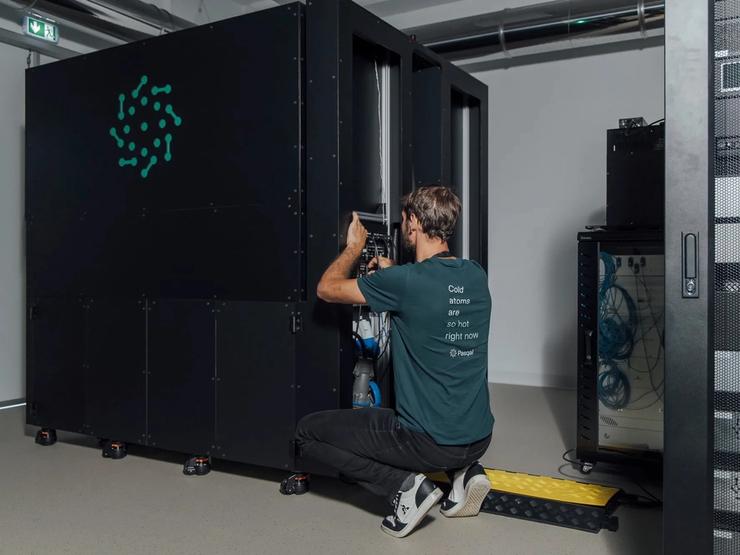 An engineer working on a Pasqal quantum processing unit.