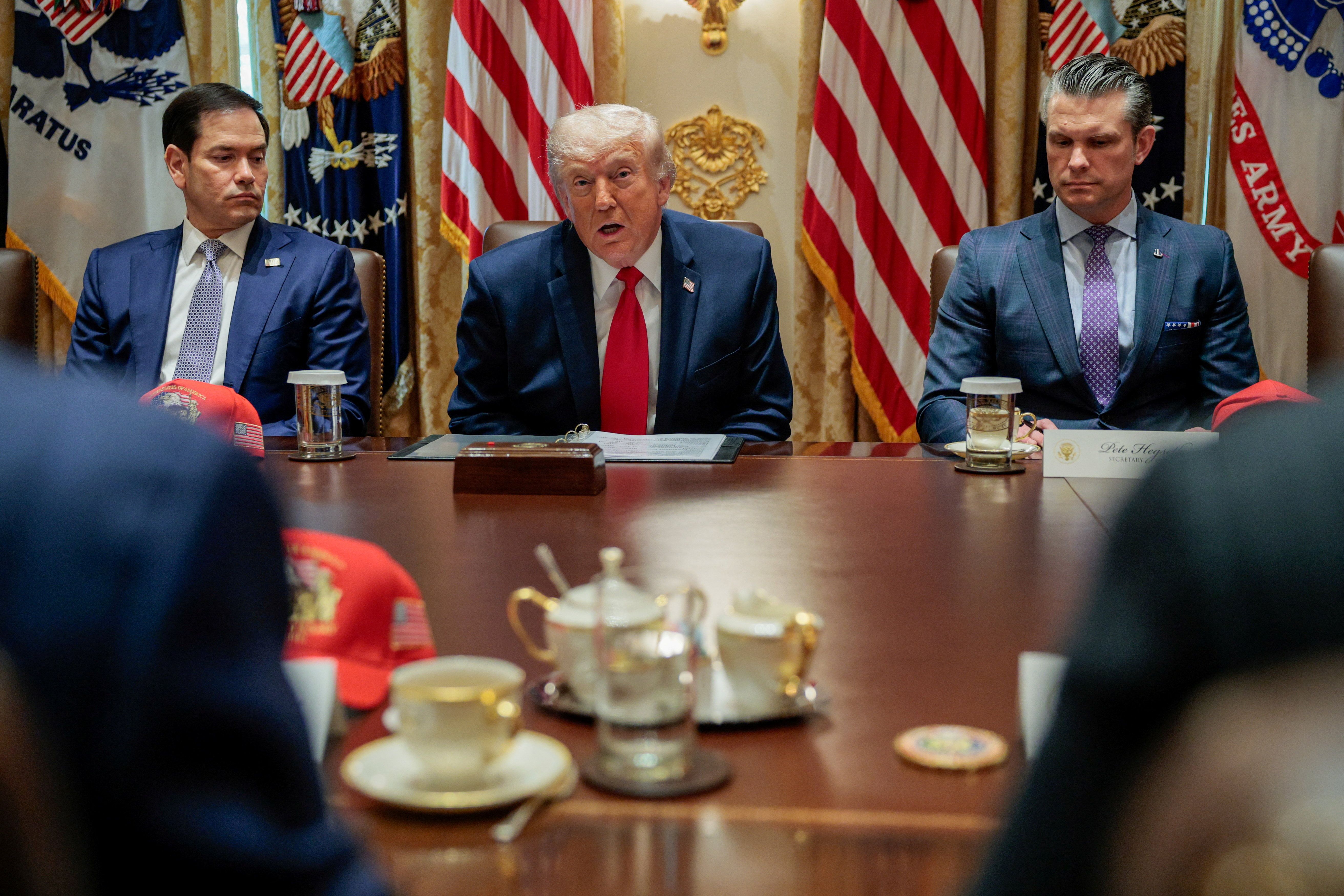 Marco Rubio, Donald Trump, and Pete Hegseth.