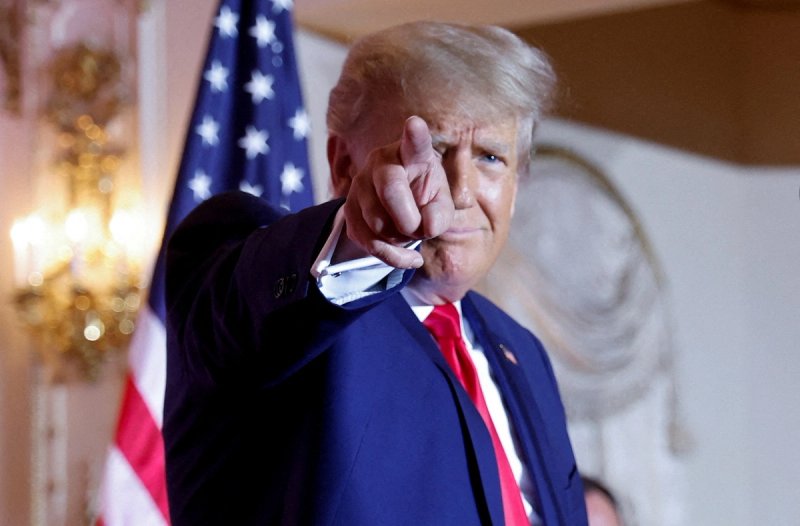 Former U.S. President Donald Trump points as he announces that he will once again run for U.S. president in the 2024 U.S. presidential election during an event at his Mar-a-Lago estate in Palm Beach, Florida.