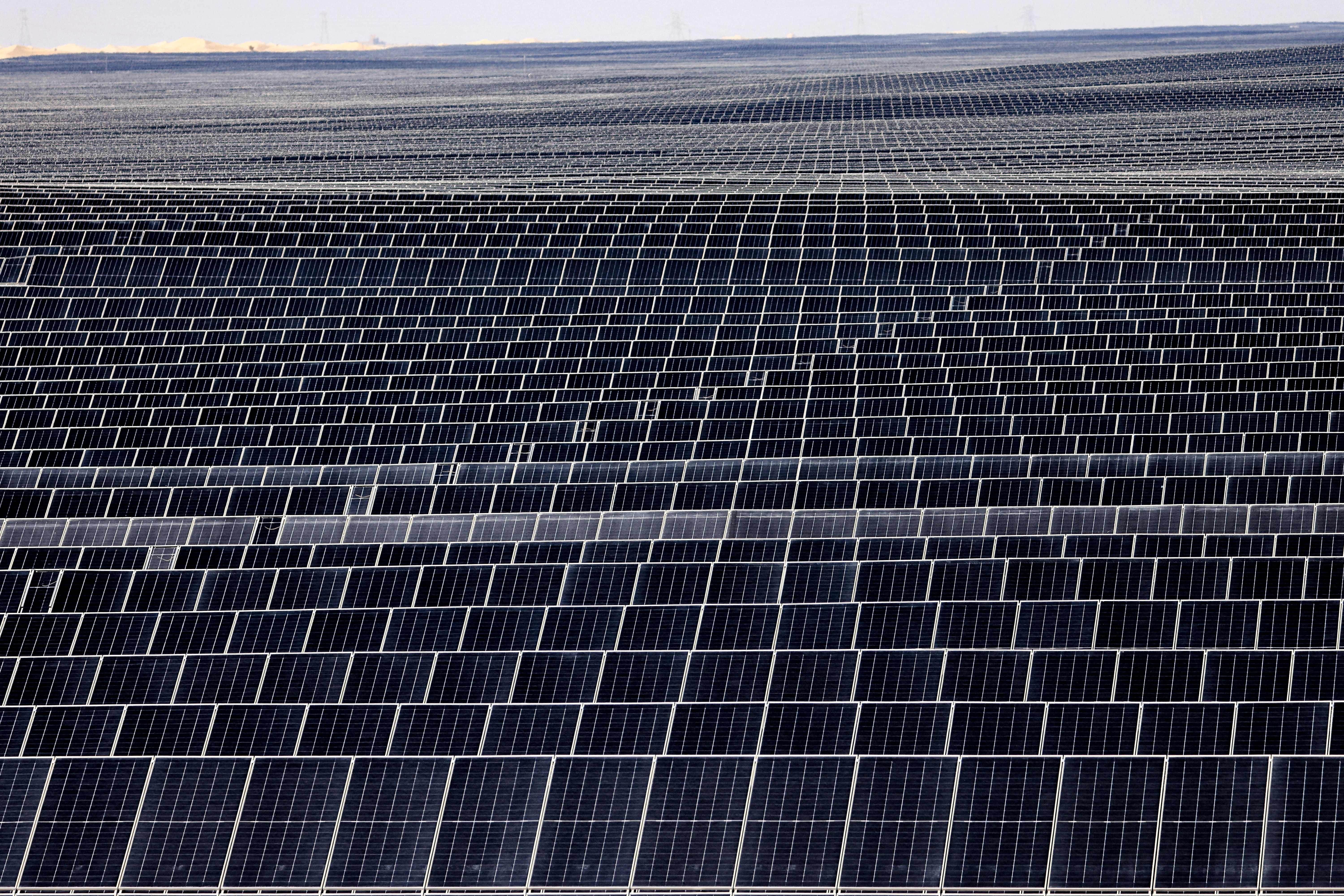 A picture shows photovoltaic panels at al-Dhafra Solar Photovoltaic.