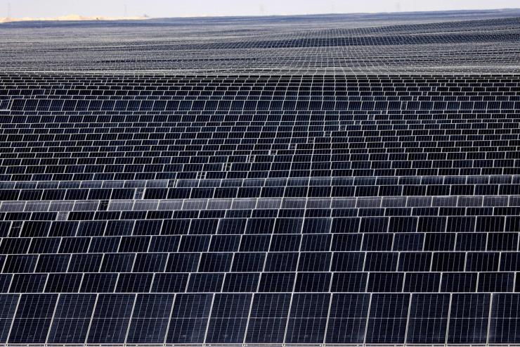 A picture shows photovoltaic panels at al-Dhafra Solar Photovoltaic.