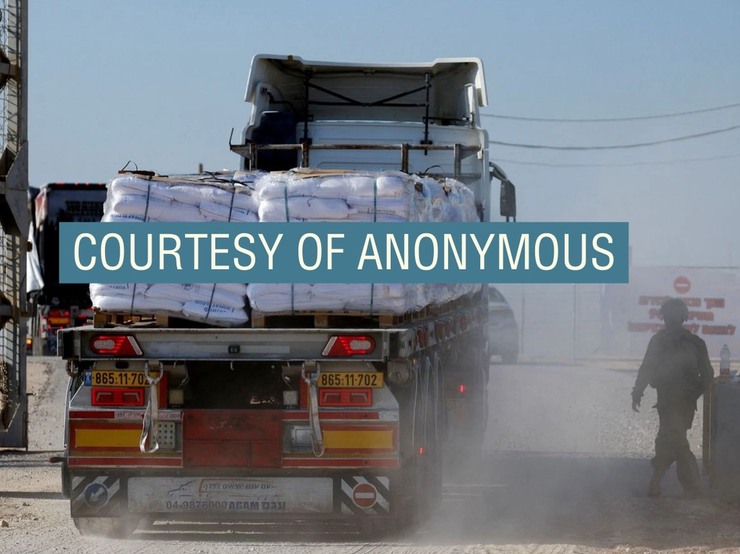 Truck carries humanitarian aid destined for the Gaza Strip