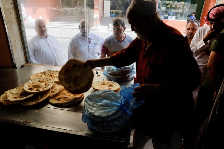 A man selling tamees in Mecca, Saudi Arabia